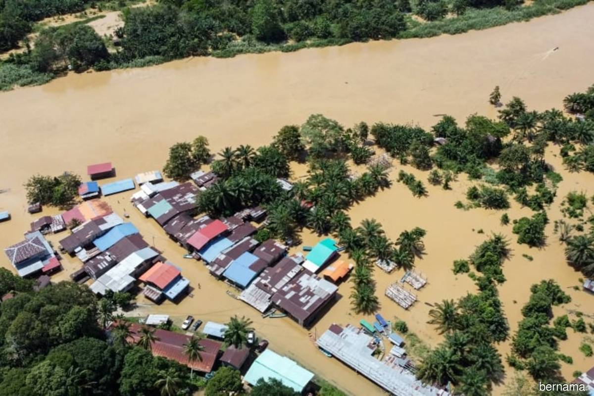 The rising water level of Sungai Kinabatangan as seen at Kampung Pangkalan Bukit Garam, Kinabatangan, Sabah on Thursday (Feb 2).